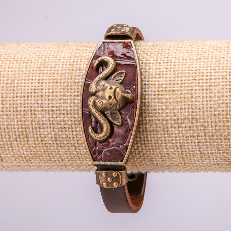 Bracelet with metal inlays, length 16-24 cm, thickness 20 mm, brown eco-leather strap
