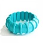 Elastic turquoise bracelet (named) smooth rondelle beads, diameter 6x4 mm ±, length 18 cm