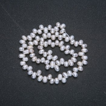 Freshwater Pearl Strand, 6x4 mm oval, 36 cm length +/- with gasoline iridescence