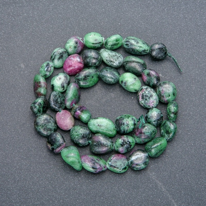Beads on a string of natural Zoisite, faceted, diameter 10x8 mm, length 41 cm +