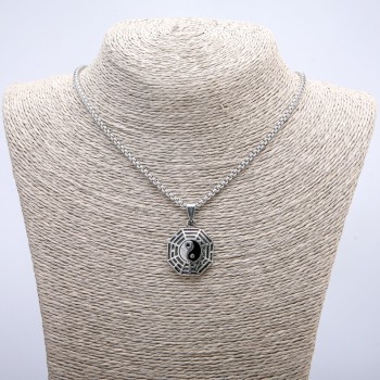 Pendant 'Yin Yang' 35×23 mm on a chain, length about 70 cm, silver-tone metal