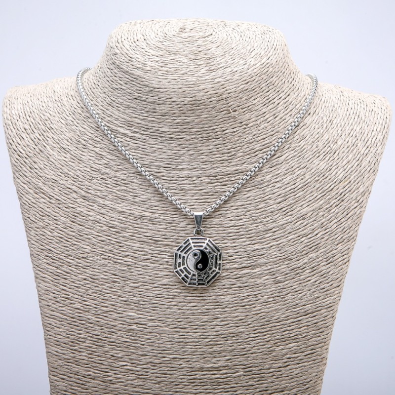 Pendant 'Yin Yang' 35×23 mm on a chain, length about 70 cm, silver-tone metal