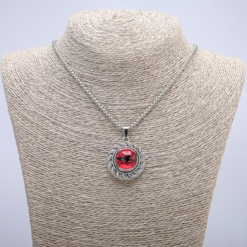 Pendant 'Dragon's Eye' in a 45×30 mm bezel on a chain, length 70 cm +/- silver-toned metal
