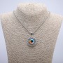 Pendant 'Eye' in a bezel 45x30 mm on a chain, length 70 cm, silver-colored metal