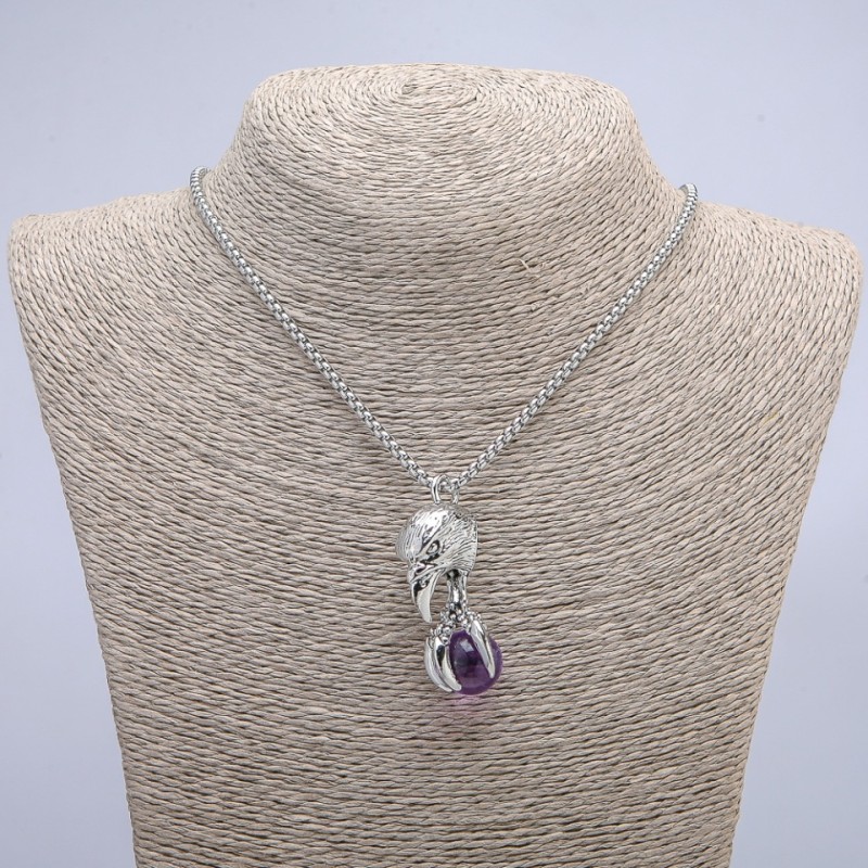Pendant "Bird with a Ball" 47x18 mm on a chain, length 70 cm +/- silver-tone metal