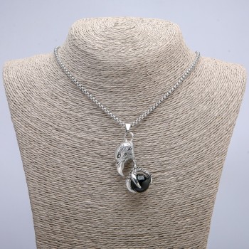 Pendant "Bird with a Ball" 47×18 mm on a chain, length 70 cm +/- silver metal