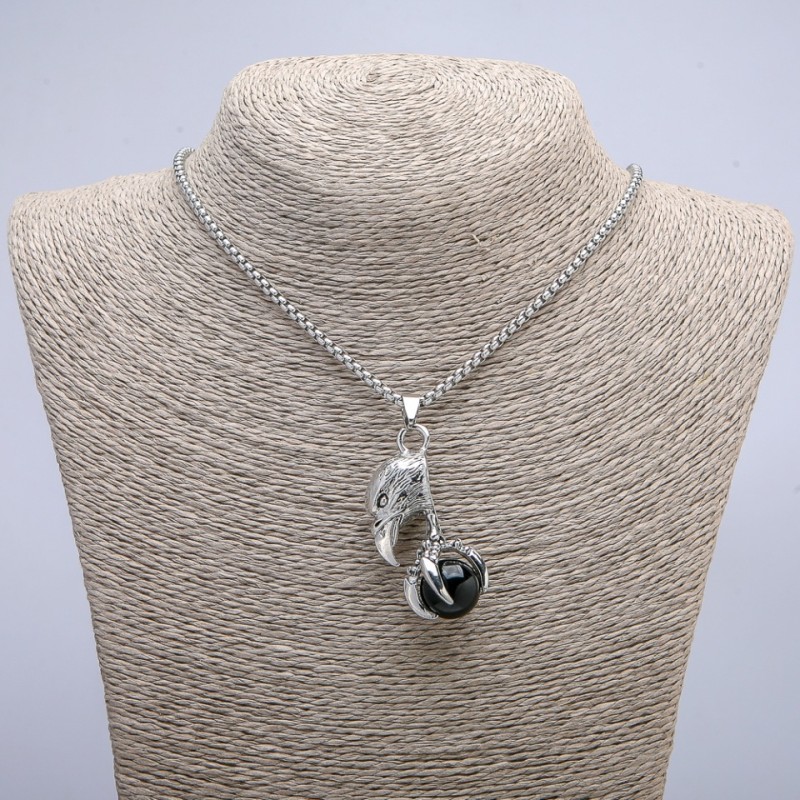 Pendant "Bird with a Ball" 47×18 mm on a chain, length 70 cm +/- silver metal