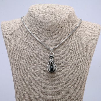 Pendant 'Paw with Sphere' 40x20 mm on a chain, length 70 cm, silver-colored metal