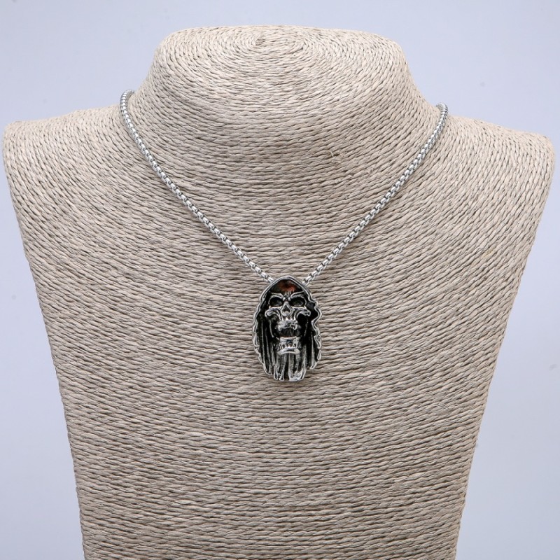 Pendant Skull 32×18 mm on chain, length 65 cm, silver metal color