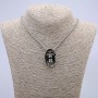 Pendant Skull 32×18 mm on chain, length 65 cm, silver metal color