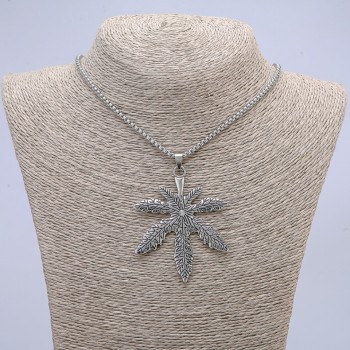Pendant 'Hemp Leaf' with white rhinestone, 72x53 mm, on a chain, 65 cm length, silver-toned metal color