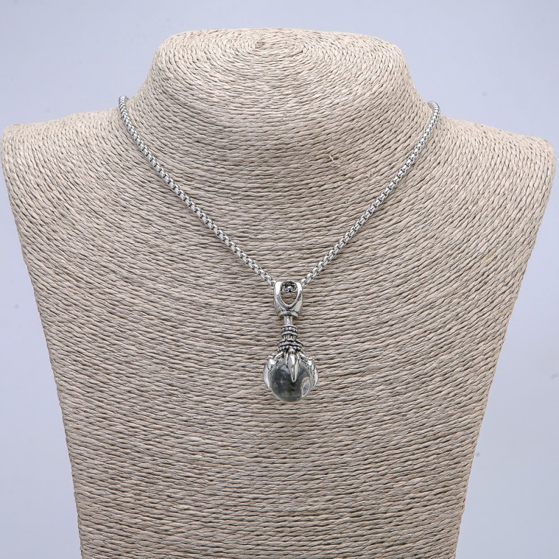 Pendant 'Paw with Sphere' 45x20 mm on a chain, length about 70 cm, silver-toned metal