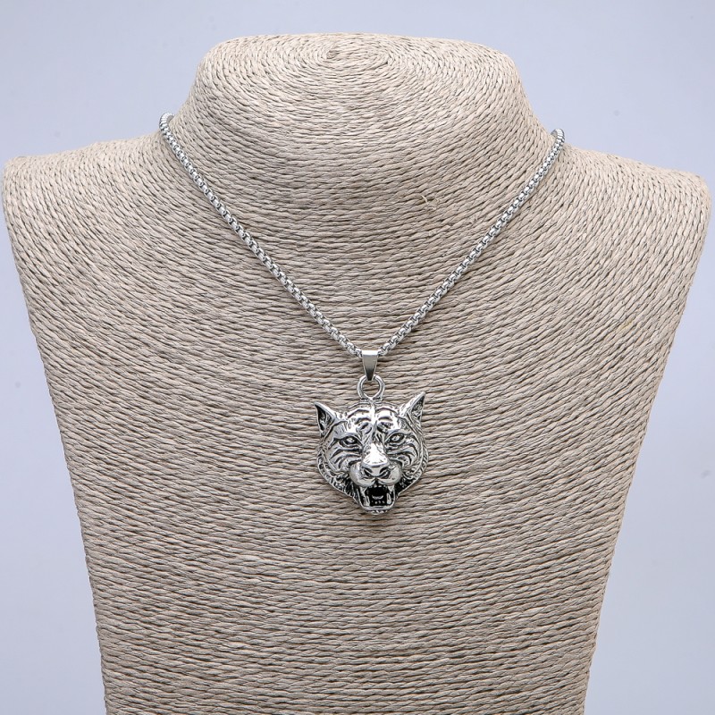 Pendant 'Tiger Head' 45x30 mm on chain, length 70 cm, silvery metal
