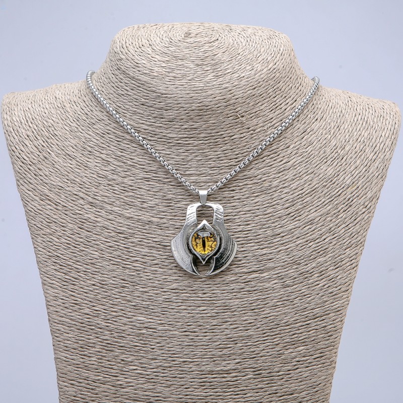 Pendant \"Dragon Eye\" in a bezel setting, 43×35 mm, on a chain, length 70 cm, silver-colored metal