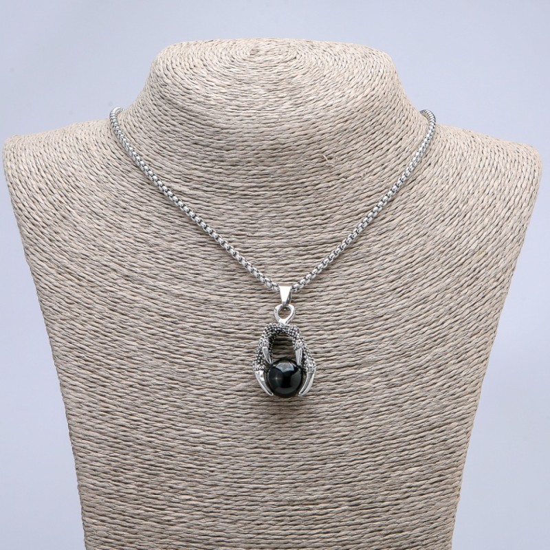 Pendant "Ball in a Paw" black 42 x 22 mm on a chain, length 70 cm +/- silver-toned metal