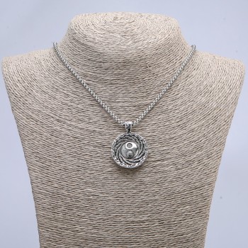 Pendant 'Yin Yang' 40×30 mm on a chain, length 70 cm, silver-toned metal