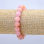 Elastic bracelet with toned quartz, smooth beads, 10 mm diameter, length 18 cm.