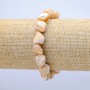 Elastic bracelet natural beige. Faceted mother-of-pearl, diameter 19×12 mm, length 18 cm+