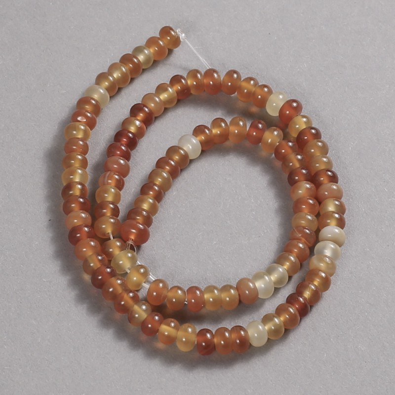 Carnelian beads on a strand of natural stone, 6x4 mm diameter +/-, length 39 cm +/-