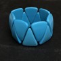 Elastic bracelet in blue turquoise triangle, diameter 34×22 mm+