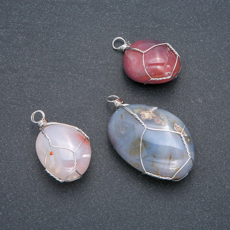 Pendant in a silver-plated weave with natural smoky agate, diameter 30x22 mm+