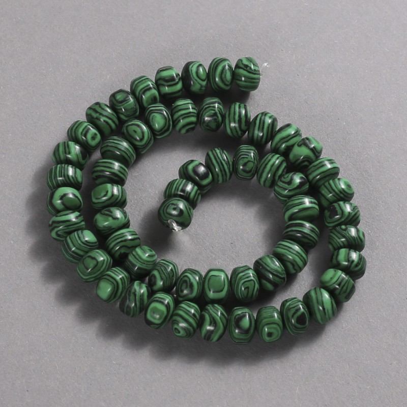 Malachite beads on thread (pressed). Smooth rondel, 9x7 mm, length 39 cm