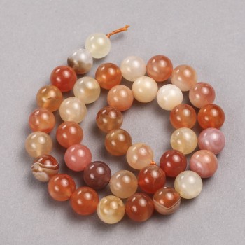 Beads on a thread of natural orange agate. Smooth round bead, diameter 10.5 mm + -, length 39 cm +