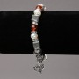 Elastic bracelet with freshwater pearls and carnelian with silver inlays, rhinestones and pendants, diameter 8 mm, length 18 cm