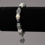 Elastic bracelet with freshwater pearls and aventurine 'Blue Sand' with silvery inserts, rhinestones and pendants, diameter 8 mm, length