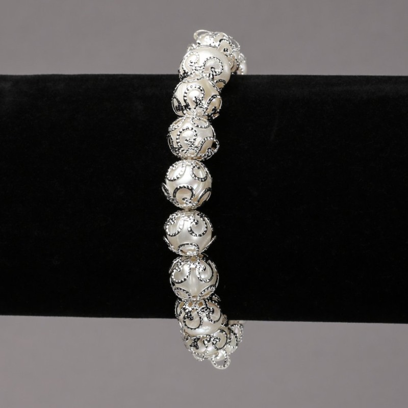 Elastic bracelet with freshwater pearls featuring silver clasps, diameter 9mm ±, length 18cm ±
