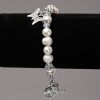 Stretch bracelet with freshwater pearls, glass elements and pendants, 8mm diameter ±, length 18cm ±