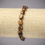 Elastic bracelet with natural Tiger's Eye stone, smooth oval beads, diameter 10×8 mm, length 18 cm