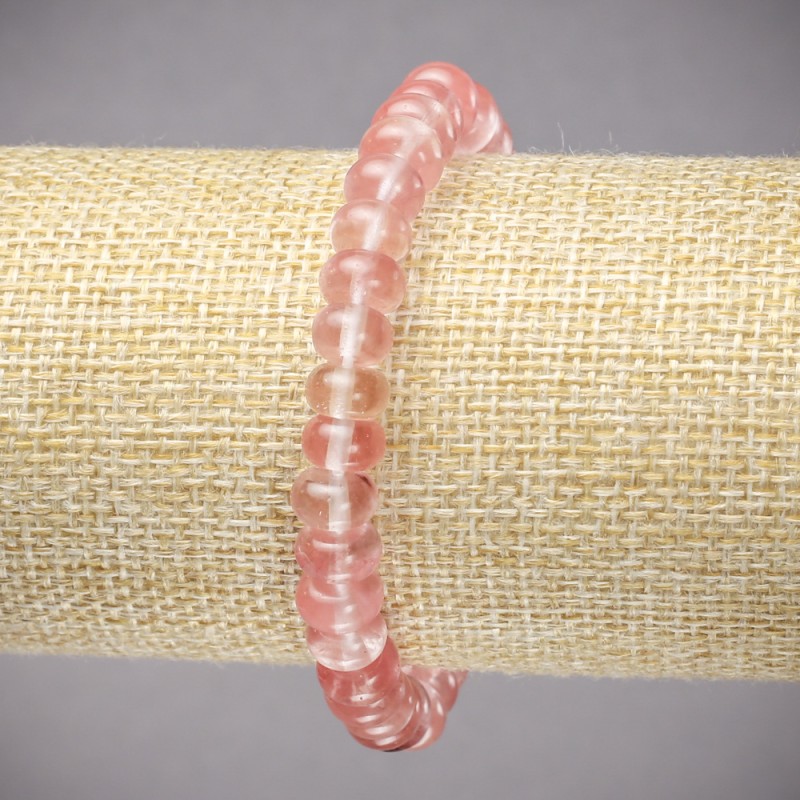 Elastic bracelet made of natural chalcedony — smooth rondel beads, diameter 8x5 mm, length 18 cm.