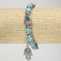 Turquoise Bracelet (named after) on elastic, 8 mm diameter ± with silver inserts in the shape of a palm and pendants, length 18 cm+