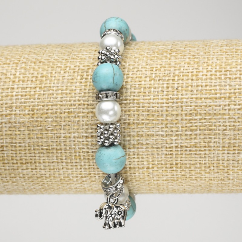 Turquoise Bracelet (named) on elastic, diameter 10mm ± with pearls (named), silver inserts and Elephant pendant, length 18 cm+