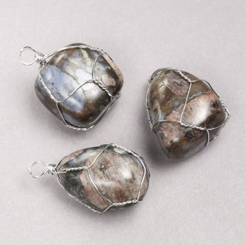 Pendant in a silver-woven setting with natural jasper, diameter 35x20 mm+