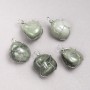 Pendant in a silver weave with natural Seraphinite stone, diameter 35x20 mm+