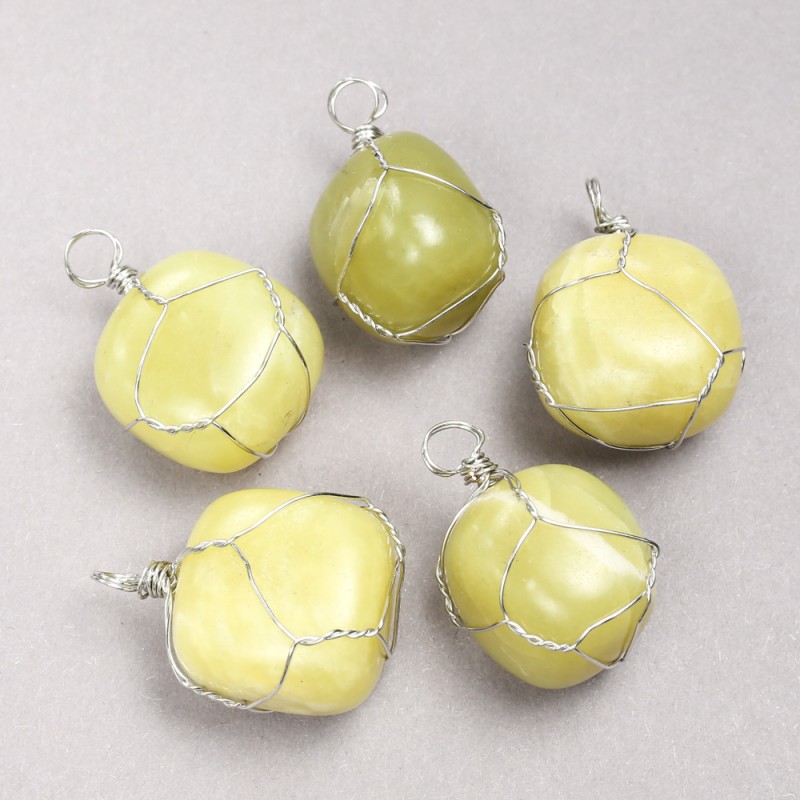 Pendant in a silver weave with natural Jadeite stone, diameter 35x20 mm+