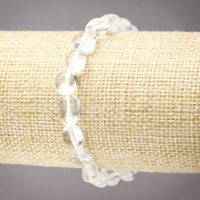Elastic bracelet with natural Mountain Crystal, faceted, bead size 8×10 mm (±)