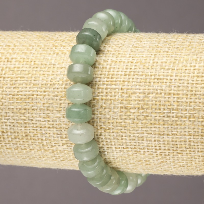 Elastic bracelet of natural jade with smooth rondels, diameter 9×7 mm