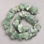 Beads of untreated jade on a thread, faceted, 10x20 mm, length 42 cm