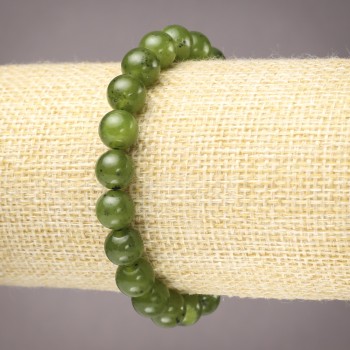 Elastic bracelet with natural stone Canadian Jadeite, smooth beads, 8 mm diameter+