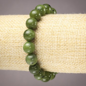 Elastic bracelet with natural stone Canadian jadeite — smooth bead, diameter 10 mm+