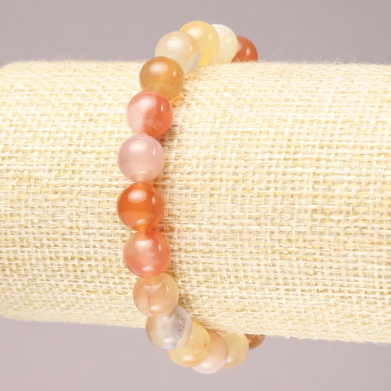 Elastic bracelet with natural orange agate — smooth bead, 8.5 mm diameter+