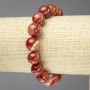 Elastic bracelet with natural orange eye agate, smooth bead, 12 mm diameter+