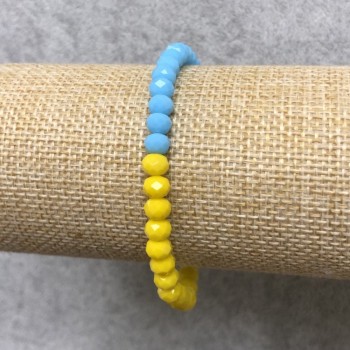 Elastic bracelet with Czech crystal 'Ukraine' faceted rondel, diameter 6×4 mm, length 18 cm