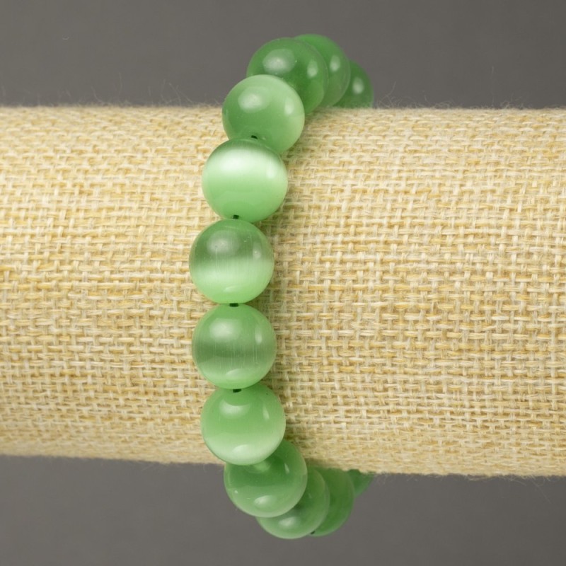 Elastic bracelet Cat's Eye green smooth bead, diameter 12mm+