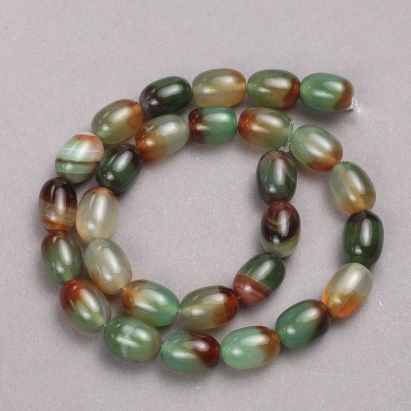 Beads from Brazilian agate on thread, smooth barrel shape, 14×10 mm diameter, length 38 cm
