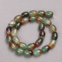 Beads from Brazilian agate on thread, smooth barrel shape, 14×10 mm diameter, length 38 cm