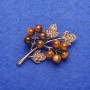 Brooch with natural Tiger's Eye stone 'Twig' silver-tone 4 x 3.5 cm